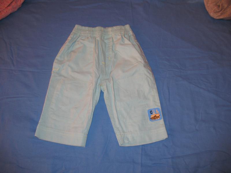 Seledynowe spodnie 62/68 cm  
